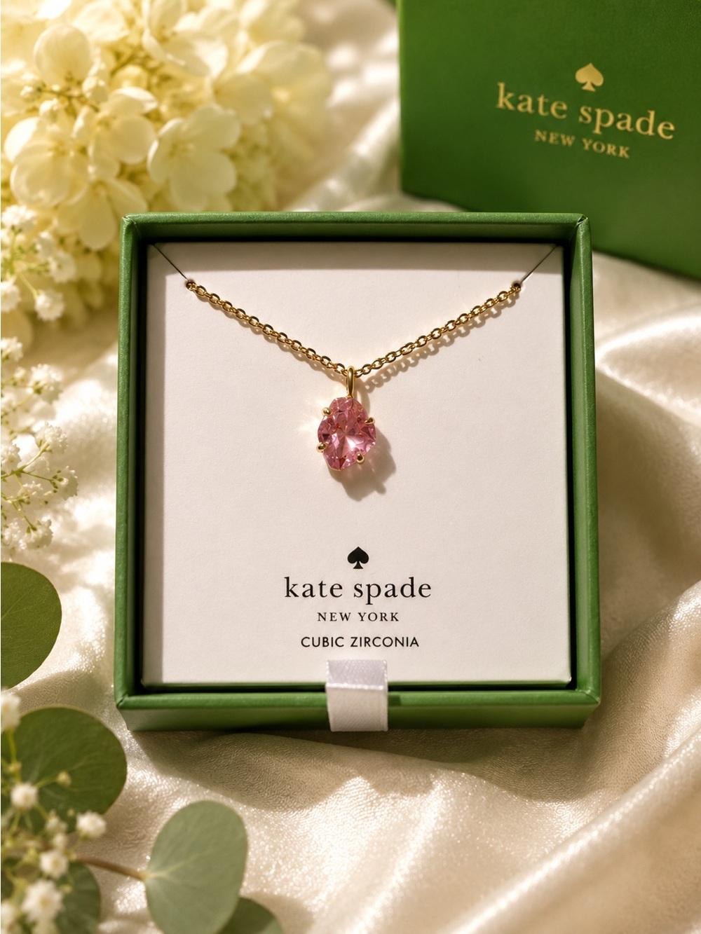 Kate Spade gold and pink necklace in box